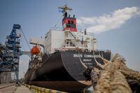 The first UN-chartered vessel MV Brave Commander loads more than 23,000 tonnes of grain to export to Ethiopia, in Yuzhne, east of Odessa on the Black Sea coast, on August 14, 2022. - On July 22, 2022 Kyiv and Moscow signed a landmark deal with Turkey to unblock Black Sea grain deliveries, following Russia's invasion of Ukraine. UN's World Food Programme has purchased an initial 30,000 tonnes of Ukrainian wheat. MV Brave Commander has a capacity of 23,000 tonnes. (Photo by OLEKSANDR GIMANOV / AFP) (Photo by OLEKSANDR GIMANOV/AFP via Getty Images)