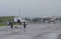 FILE - Taiwanese Mirage 2000 fighter jets taxi along a runway during a drill at an airbase in Hsinchu, Taiwan, Wednesday, Jan. 11, 2023. Taiwan scrambled fighter jets, put its navy on alert and activated missile systems Tuesday, Jan. 31, 2023, in response to nearby operations of 34 Chinese military aircraft and nine warships that are part Beijing's strategy to unsettle and intimidate the self-governing island democracy. (AP Photo/Johnson Lai, File)