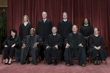 FILE - Members of the Supreme Court sit for a new group portrait following the addition of Associate Justice Ketanji Brown Jackson, at the Supreme Court building in Washington, Friday, Oct. 7, 2022. Bottom row, from left, Justice Sonia Sotomayor, Justice Clarence Thomas, Chief Justice of the United States John Roberts, Justice Samuel Alito, and Justice Elena Kagan. Top row, from left, Justice Amy Coney Barrett, Justice Neil Gorsuch, Justice Brett Kavanaugh, and Justice Ketanji Brown Jackson. (AP Photo/J. Scott Applewhite, File)