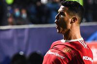 Manchester United's Portugal's forward Cristiano Ronaldo celebrates after scoring a goal during the UEFA Champions League group F football match between Atalanta and Manchester United at the Azzurri d'Italia stadium, in Bergamo, on November 2, 2021. (Photo by Marco BERTORELLO / AFP) (Photo by MARCO BERTORELLO/AFP via Getty Images)