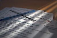 Tax forms are shown in Toronto on Thursday April 5, 2018. THE CANADIAN PRESS/Doug Ives