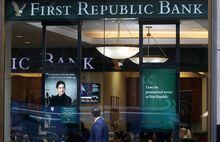 FILE PHOTO: A person walks past the First Republic Bank branch in Midtown Manhattan in New York City, New York, U.S., March 13, 2023. REUTERS/Mike Segar
