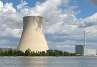 FILE PHOTO: Clouds are seen over the cooling tower of the nuclear power plant Isar 2 by the river Isar amid the energy crisis caused by Russia's invasion of Ukraine, in Eschenbach near Landshut, Germany, August 1, 2022. REUTERS/Ayhan Uyanik/File Photo