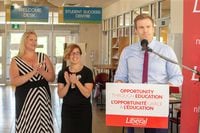New Brunswick Liberal Leader Susan Holt, centre, pictured with then-leader Brian Gallant and Amber Bishop at a campaign stop in Fredericton on Wednesday, Sept. 5, 2018. THE CANADIAN PRESS/James West