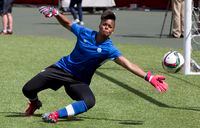 Canada's goalkeeper Karina LeBlanc makes a save during a practice session in Edmonton on Friday June 5, 2015. LeBlanc knew life would change when she became a mother. But the former Canadian international goalkeeper did not expect the emotional roller-coaster that followed the birth of daughter Paris, with terrifying health issues forcing LeBlanc back to hospital before having to endure a 14-day self-quarantine at home away from her newborn. THE CANADIAN PRESS/Jason Franson
