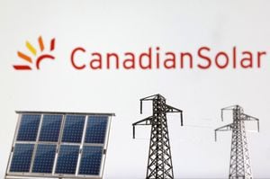 FILE PHOTO: Miniatures of solar panel and electric pole are seen in front of Canadian Solar logo in this illustration taken January 17, 2023. REUTERS/Dado Ruvic/Illustration/File Photo