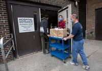 Emergency department staff at St. Joseph's Health Centre received a delivery of prepared meals from Santaguida Fine Foods on, April 28 2020. Santaguida Fine Foods is a Toronto catering company who are delivering meals to frontline healthcare workers in hospitals.