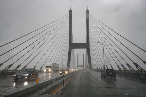 Drivers interfered with officers’ attempts to talk with man in mental health crisis on B.C. bridge, police say