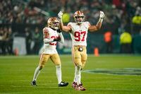 San Francisco 49ers defensive end Nick Bosa (97) and safety Ji'Ayir Brown (27) react during the first half of an NFL football game against the Philadelphia Eagles, Sunday, Dec. 3, 2023, in Philadelphia. (AP Photo/Chris Szagola)