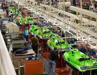 Employees work on the SeaDoo assembly line at the Bombardier Recreational Products plant, Thursday, June 12, 2014 in Valcourt, Quebec.