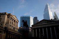 FILE PHOTO: The Bank of England and the City of London financial district in London, Britain, November 5, 2020. REUTERS/John Sibley/File Photo