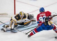 Boston Bruins goaltender Jeremy Swayman (1) stops Montreal Canadiens' Jonathan Drouin (92) during third period NHL hockey action in Montreal, Monday, March 21, 2022. THE CANADIAN PRESS/Ryan Remiorz