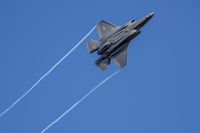 A U.S. F-35 fighter jet flies over the Eifel Mountains near Spangdahlem, Germany, Wednesday, Feb. 23, 2022. The Liberal government is expected to announce this afternoon that it will enter into final negotiations on purchasing the F-35. (Harald Tittel/dpa via AP)