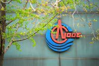 The logo of China National Offshore Oil Corp (CNOOC) is pictured at its headquarters in Beijing on April 4, 2018.