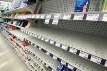 Empty shelves of children's pain relief medicine are seen at a Toronto pharmacy, Wednesday, August 17, 2022. Critics and parents are calling for action to address an ongoing shortage of some kids' pain and fever medications ahead of flu season and a potential new COVID-19 wave. THE CANADIAN PRESS/Joe O'Connal