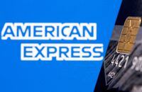 FILE PHOTO: Credit card is seen in front of displayed American Express logo in this illustration taken, July 15, 2021. REUTERS/Dado Ruvic/Illustration/File Photo