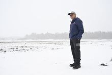PHOTO BERNARD BRAULT,  SPECIAL FOR THE GLOBE AND MAILFebruary 17th, 2023St-Bernard de Lacolle, Québec:Matthias Kaiser (Father) stands in his field near US boarder.