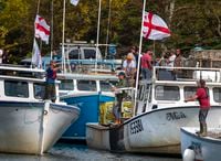 Members of the Potlotek First Nation prepare their boats at the wharf in St. Peter’s, N.S., as they participate in a self-regulated commercial lobster fishery on Oct. 1, 2020, which is Treaty Day. The day recognizes the signing of peace and friendship treaties between the Mi'kmaq and the Crown in the 1700s.