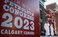 Members of the Saudi delegation wait for transportation at the World Petroleum Congress  in Calgary, Monday, Sept. 18, 2023.THE CANADIAN PRESS/Jeff McIntosh
