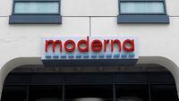 FILE - A sign marks an entrance to a Moderna building in Cambridge, Mass., on Monday, May 18, 2020.   Moderna shares slipped Tuesday, April 11, 2023, after the COVID-19 vaccine developer said its potential flu vaccine needs more study in a late-stage clinical trial.  (AP Photo/Bill Sikes, File)
