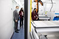 Randy MacEwen, left, CEO of Ballard Power Systems, and Jyoti Sidhu, middle, Vice President of Operations, visit the Ballard Power Systems fuel cell production facility in Burnaby, British Columbia, Monday, November 9, 2020. Rafal Gerszak/The Globe and Mail 