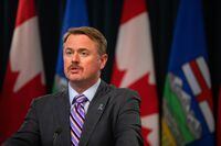 Alberta Justice Minister Tyler Shandro speaks at a press conference on Tuesday, Nov. 29, 2022. The Alberta government introduced legislation Tuesday aimed at bulking up in its ongoing firearms feud with the federal government. THE CANADIAN PRESS/Jason Franson