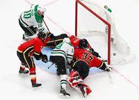 Radek Faksa of the Dallas Stars scores on the power-play against David Rittich of the Calgary Flames at 5:47 of the second period in Game Six of the Western Conference First Round at Rogers Place in Edmonton on Aug. 20, 2020.