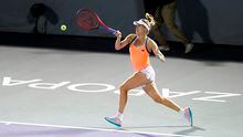 Canada's Eugenie Bouchard hits a forehand to Sara Sorribes Tormo, of Spain, during the women's final in the Abierto of Zapopan tennis tournament in Zapopan, Mexico, Saturday, March 13, 2021.  (AP Photo/Refugio Ruiz)