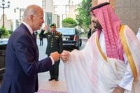 Saudi Crown Prince Mohammed bin Salman fist bumps U.S. President Joe Biden upon his arrival at Al Salman Palace, in Jeddah, Saudi Arabia, July 15, 2022. Bandar Algaloud/Courtesy of Saudi Royal Court/Handout via REUTERS ATTENTION EDITORS - THIS PICTURE WAS PROVIDED BY A THIRD PARTY     TPX IMAGES OF THE DAY