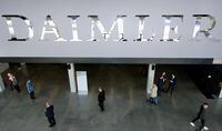 FILE PHOTO: The Daimler logo is seen before the Daimler annual shareholder meeting in Berlin, Germany, April 5, 2018. REUTERS/Hannibal Hanschke/File Photo