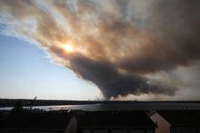 Thick plumes of heavy smoke fill the Halifax sky as an out-of-control fire in a suburban community quickly spread, engulfing multiple homes and forcing the evacuation of local residents on Sunday May 28, 2023. THE CANADIAN PRESS/Kelly Clark