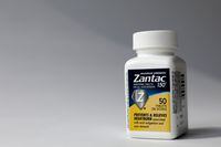 FILE PHOTO: A bottle of Zantac heartburn drug is seen in this picture illustration taken October 1, 2019. REUTERS/Brendan McDermid/Illustration
