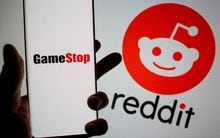 FILE PHOTO: GameStop logo is seen in front of displayed Reddit logo in this illustration taken on Febr. 2, 2021. REUTERS/Dado Ruvic/Illustration/File Photo