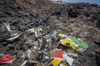 Wreckage lies at the scene of an Ethiopian Airlines flight that crashed shortly after takeoff at Hejere near Bishoftu, some 50 kilometers south of Addis Ababa, in Ethiopia on Sunday, March 10, 2019.