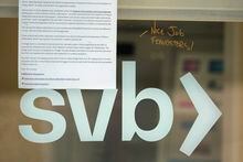 A note is written on a glass door of a Silicon Valley Bank branch location in Pasadena, Calif., Monday, March 27, 2023. A regulatory filing shows the Canadian branch of Silicon Valley Bank is not included in First Citizens' purchase of most of the failed U.S. bank. THE CANADIAN PRESS/AP-Damian Dovarganes