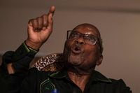 Former South African president Jacob Zuma addresses the media in his home in Nkandla, KwaZulu-Natal on July 4, 2021. - South Africa's former president Jacob Zuma, ordered to surrender himself to start a 15-month jail term for contempt, said on July 4, 2021, he would not be doing so by the court-set deadline. "No need for me to go to jail today," he told journalists at his Nkandla homestead in Kwa-Zulu Natal province, where hundreds of his supporters are camped outside in solidarity. (Photo by Emmanuel Croset / AFP) (Photo by EMMANUEL CROSET/AFP via Getty Images)