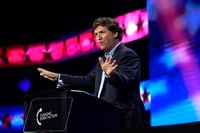 Tucker Carlson speaks at the Turning Point Action conference, Saturday, July 15, 2023, in West Palm Beach, Fla.
