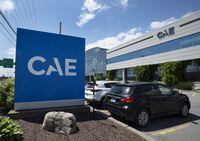 The CAE logo is seen in front of the aerospace company’s plant, Thursday, July 21, 2022 in Montreal. THE CANADIAN PRESS/Ryan Remiorz