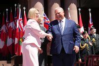 Sylvia Jones, Deputy Premier and Minister of Health shakes hands with Premier Doug Ford as she takes her oath at the swearing-in ceremony at Queen’s Park in Toronto on June 24, 2022. THE CANADIAN PRESS/Nathan Denette