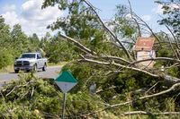 Debris along Highway 7 from the aftermath of a possible tornado is shown in Tweed, Ont., on Monday, July 25, 2022. THE CANADIAN PRESS/Lars Hagberg