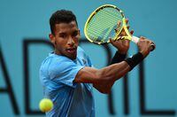 MADRID, SPAIN - MAY 04: Felix-Auger Aliassime of Canada returns a backhand in their second round match against Felix-Auger Aliassime of Canada on day seven of Mutua Madrid Open at La Caja Magica on May 04, 2022 in Madrid, Spain. (Photo by Denis Doyle/Getty Images)