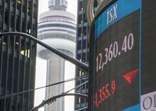 A sign board in Toronto displays the TSX close on Monday, March 16, 2020. THE CANADIAN PRESS/Frank Gunn
