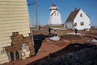 Damage to cottages and businesses sustained during post-tropical storm Fiona in the fall of 2022 is seen in North Rustico Harbour, P.E.I. on Sunday, April 2, 2023. THE CANADIAN PRESS/Darren Calabrese