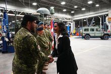 Defence Minister Anita Anand greets Canadian Forces personnel at CFB Kingston, in Kingston, Ont., Tuesday, March 7, 2023. Anand says Ottawa will fast-track the purchase of anti-tank, anti-aircraft and anti-drone weapons for the Canadian military with a mechanism last used during the war in Afghanistan. THE CANADIAN PRESS/Sean Kilpatrick