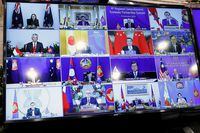 ASEAN leaders are seen on a screen as they attend the 4th Regional Comprehensive Economic Partnership Summit as part of the 37th ASEAN Summit in Hanoi, Vietnam November 15, 2020. REUTERS/Kham