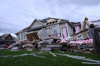 Damage left after a tornado touched down in a neighbourhood in Barrie, Ont., is shown on Thursday, July 15, 2021. THE CANADIAN PRESS/Christopher Katsarov