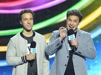 Co-founders of WE Craig Kielburger (L) and Mark Kielburger (R) speak on stage during WE Day California at the Forum in Inglewood, California on April 25, 2019. - WE Day is the worlds largest youth empowerment event bringing together world-renowned speakers and award-winning performers. (Photo by Valerie MACON / AFP)VALERIE MACON/AFP/Getty Images