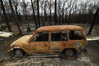 This photo taken on January 15, 2020 shows a burnt vehicle seen after a bushfire in Budgong area of New South Wales, Australia.