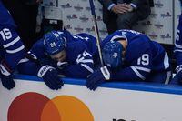 Aug 9, 2020; Toronto, Ontario, CAN; Toronto Maple Leafs  forward Kasperi Kapanen (24) and forward Jason Spezza (19) react after a loss to the Columbus Blue Jackets during the third period of game five of the Eastern Conference qualifications at Scotiabank Arena. Columbus eliminated Toronto with a win. Mandatory Credit: John E. Sokolowski-USA TODAY Sports