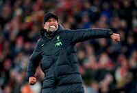 Liverpool manager Juergen Klopp celebrates at the end of the English Premier League soccer match between Liverpool and Luton Town, at Anfield stadium in Liverpool, England, Wednesday, Feb. 21, 2024. (Peter Byrne/PA via AP)